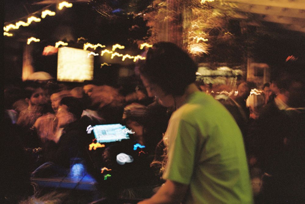 Blurry image of Luke CVR Djing